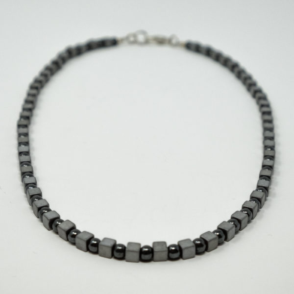 Linda McFarlane's dainty haematite necklace is a classic. Alternating cubes and beads in shades of dark grey, is one of Linda's signature styles. It is stylish, easy to wear and goes with almost anything. You will find you wear it all the time.