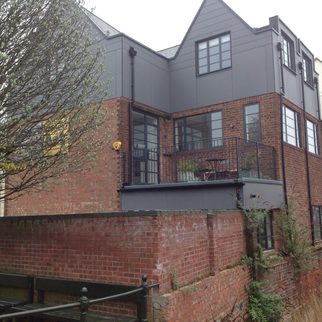 The building conversion: Rear view of the building over the River Purfleet