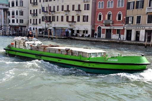 Veritas garbage boat in Venice