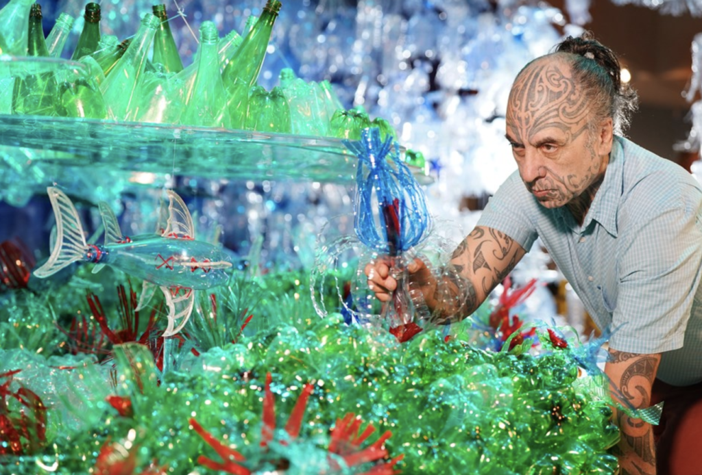 Nuku working with plastic